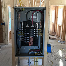 Electric service panel inside a newly constructed building