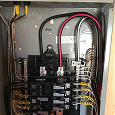 Electric service panel inside a newly constructed building