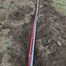 Laying electrical wires underground