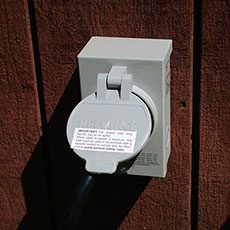 Generator interlock hookup on the exterior of a house