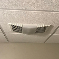 Bathroom ventilation fan with a light